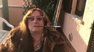 Augusta- A fetish slut dom wife smoker with fur and holder
